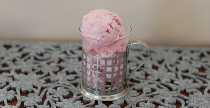 This Creamy Strawberry Ice Cream is so delicious no one will ever miss the dairy. It's made with coconut milk for it's richness, and sweetened with pure maple syrup or honey. The maple syrup version is so good! -- The Nourishing Gourmet