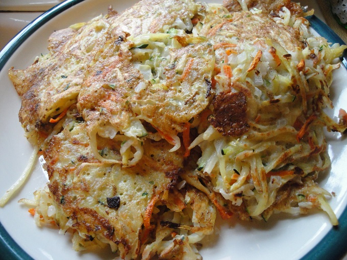 Vegetable Pancakes are a tasty way to get vegetables in! Even kids love them. Go to post for 4 more great ideas for including vegetables in your breakfast.  