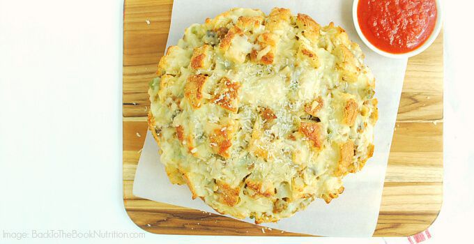 Cheesy pull apart bread made with sourdough, Italian sausage, veggies, and two cheeses -- The Nourishing Gourmet