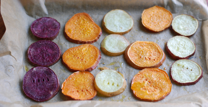 Roasted Sweet Potato Rounds - These only take fifteen minutes to make, and are a delicious way to enjoy sweet potatoes (look at the variety of sweet potatoes you can choose from! They are beautiful!) -- The NourishingGourmet .com